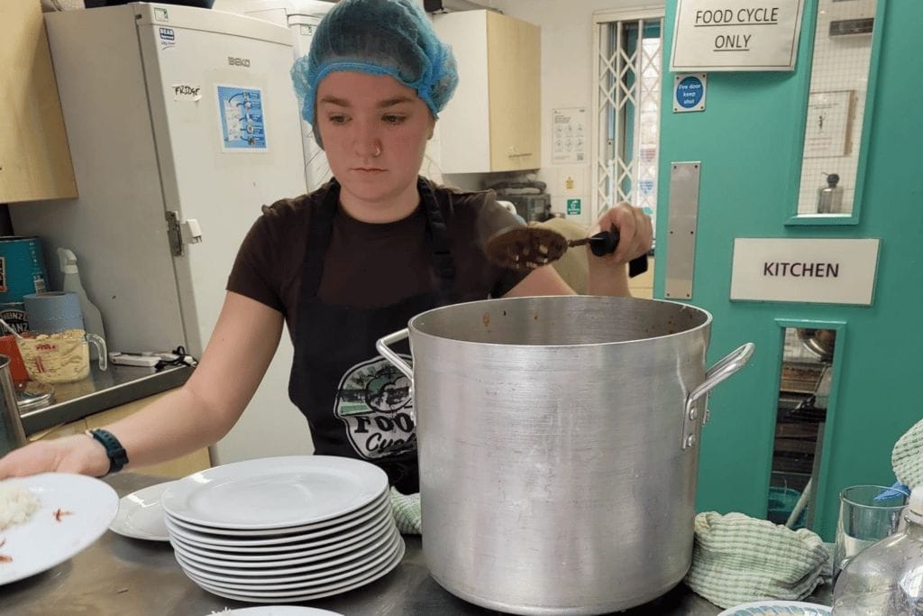 Young student serving food